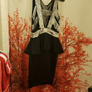 A DRESS AND A PANTS SUIT